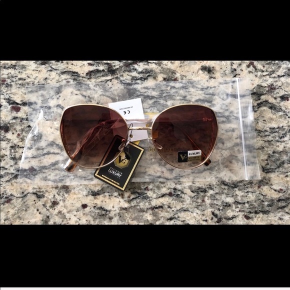 Brown luxury sunglasses with UV protection. NWOT. - Picture 1 of 5